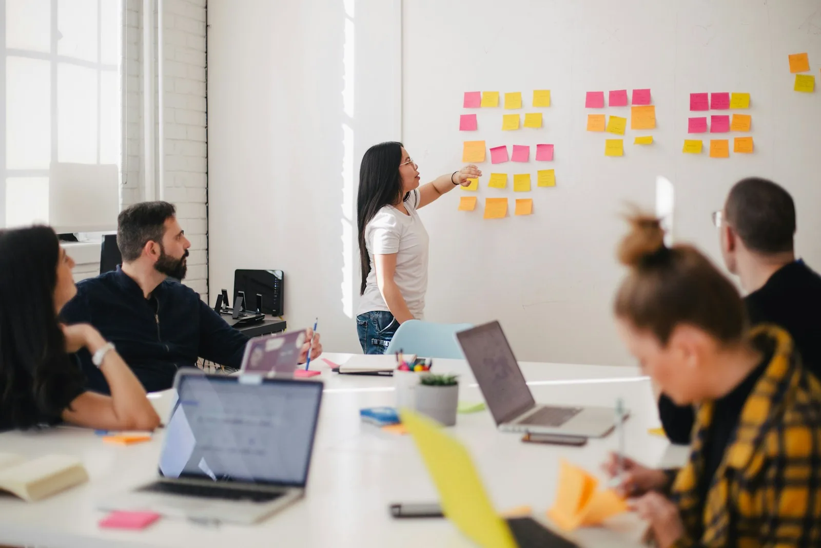 A team reviewing priorities together in a clear workshop session
